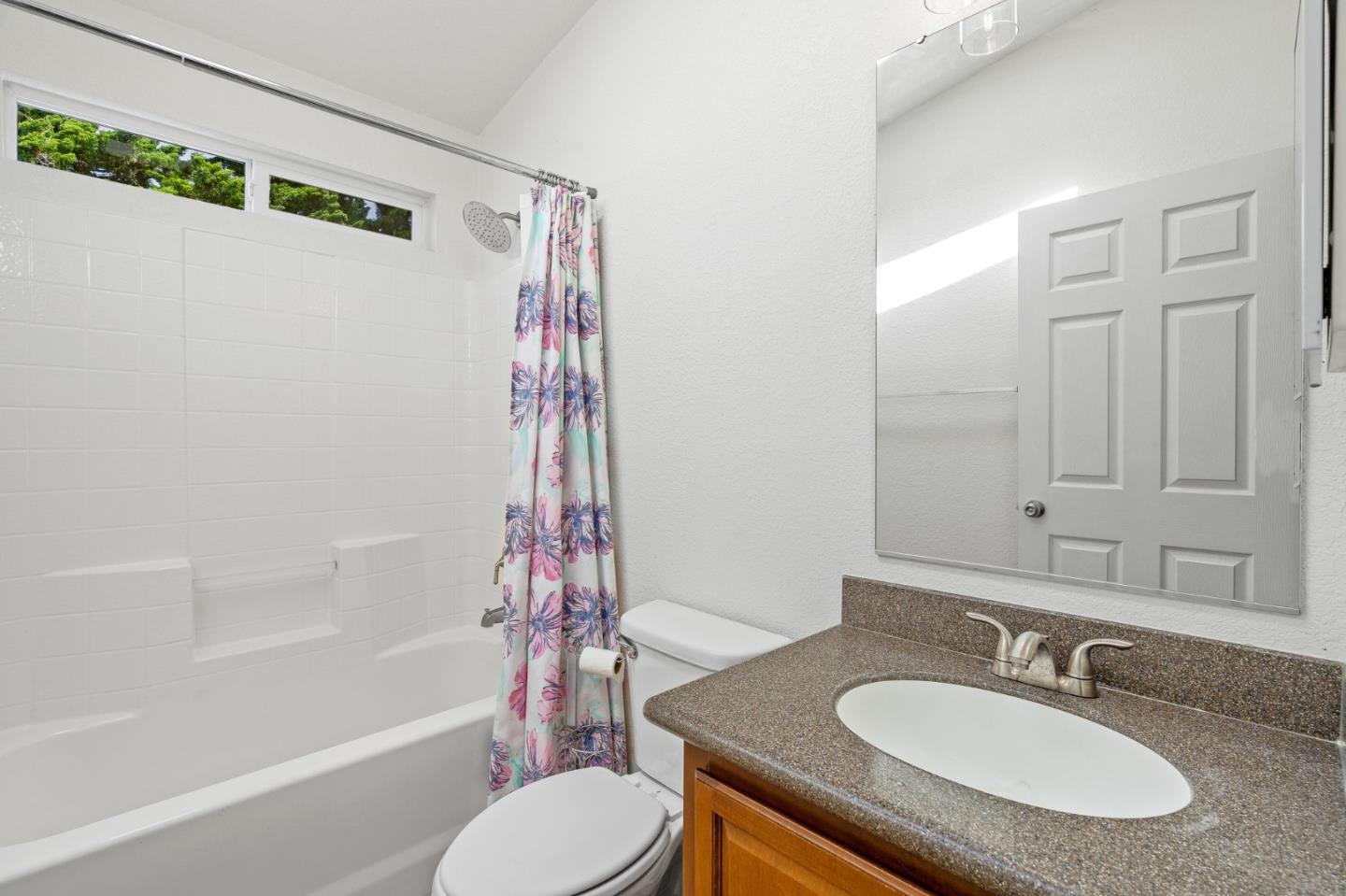 100 North Rodeo Gulch Road, Unit 31 Soquel, CA 95073 - Photo 26 of 38 a bathroom with a sink toilet and shower