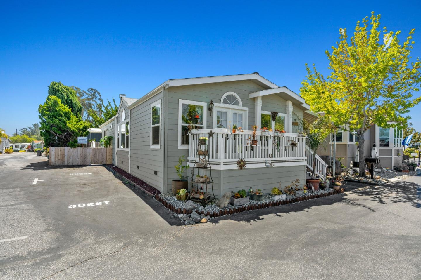 100 North Rodeo Gulch Road, Unit 31 Soquel, CA 95073 - Photo 3 of 38 a front view of a house with a yard