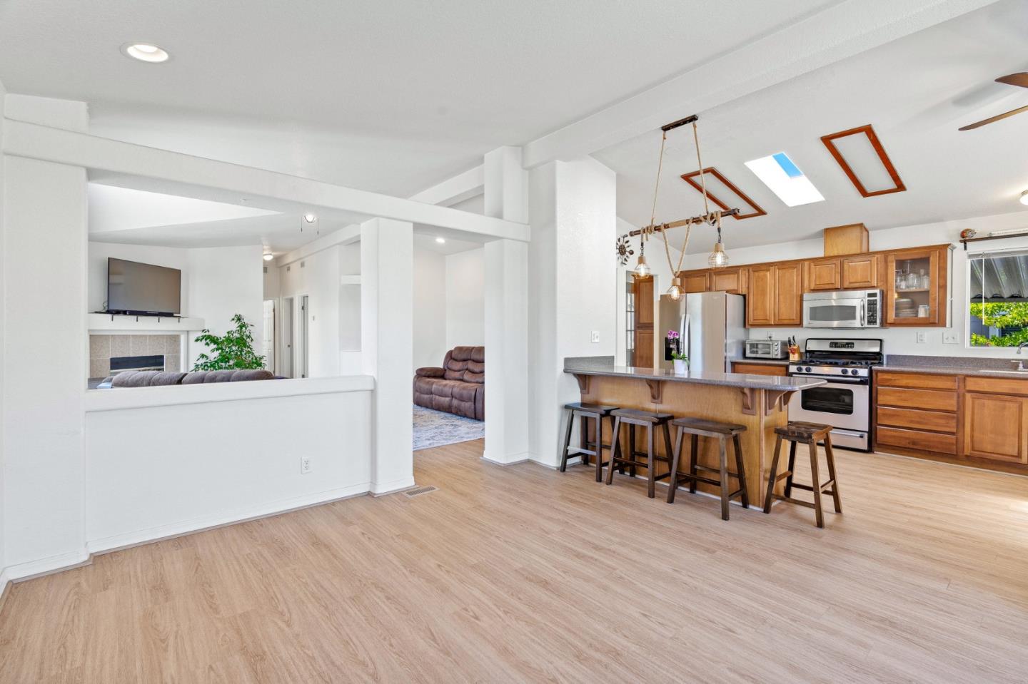 100 North Rodeo Gulch Road, Unit 31 Soquel, CA 95073 - Photo 8 of 38 a view of a dining room with furniture and wooden floor