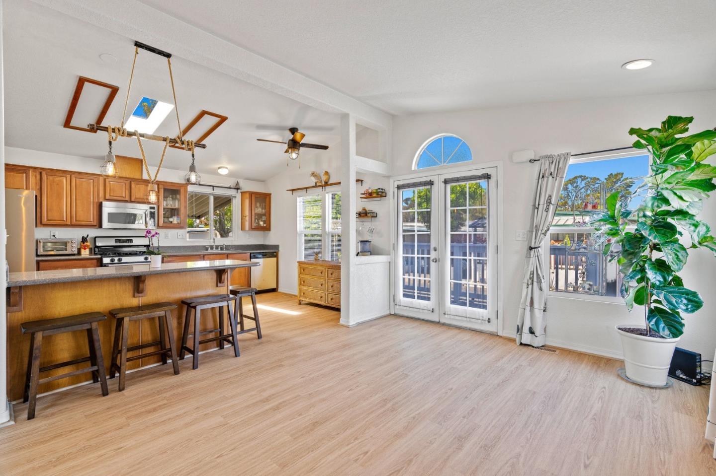 100 North Rodeo Gulch Road, Unit 31 Soquel, CA 95073 - Photo 9 of 38 a view of a dining room with furniture window and wooden floor