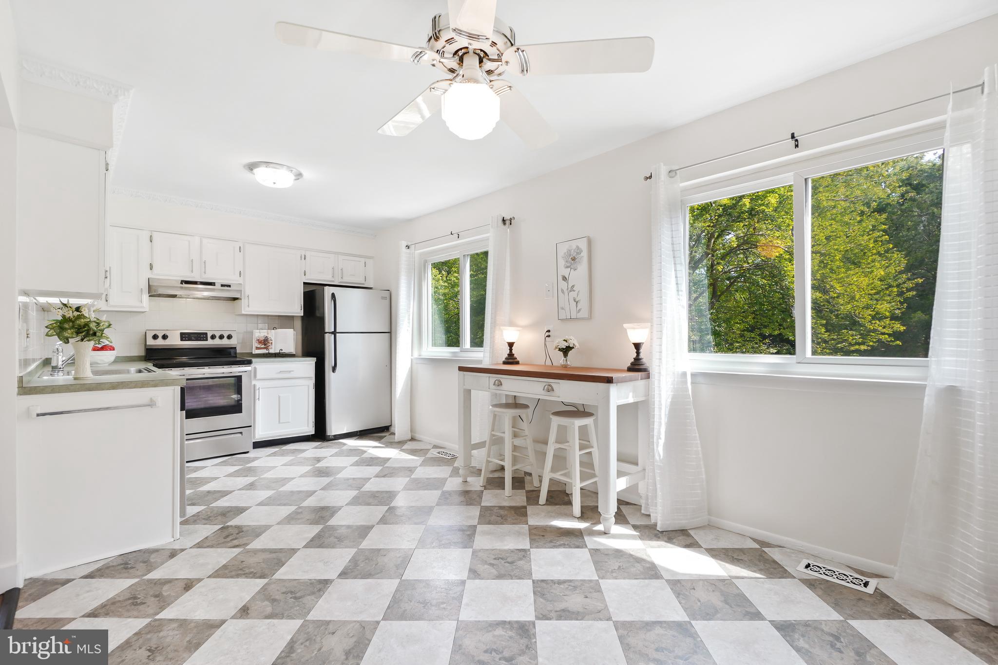 8900 Centerway Road Gaithersburg, MD 20879 - Photo 9 of 32 Kitchen w/ two large windows, lot of natural light
