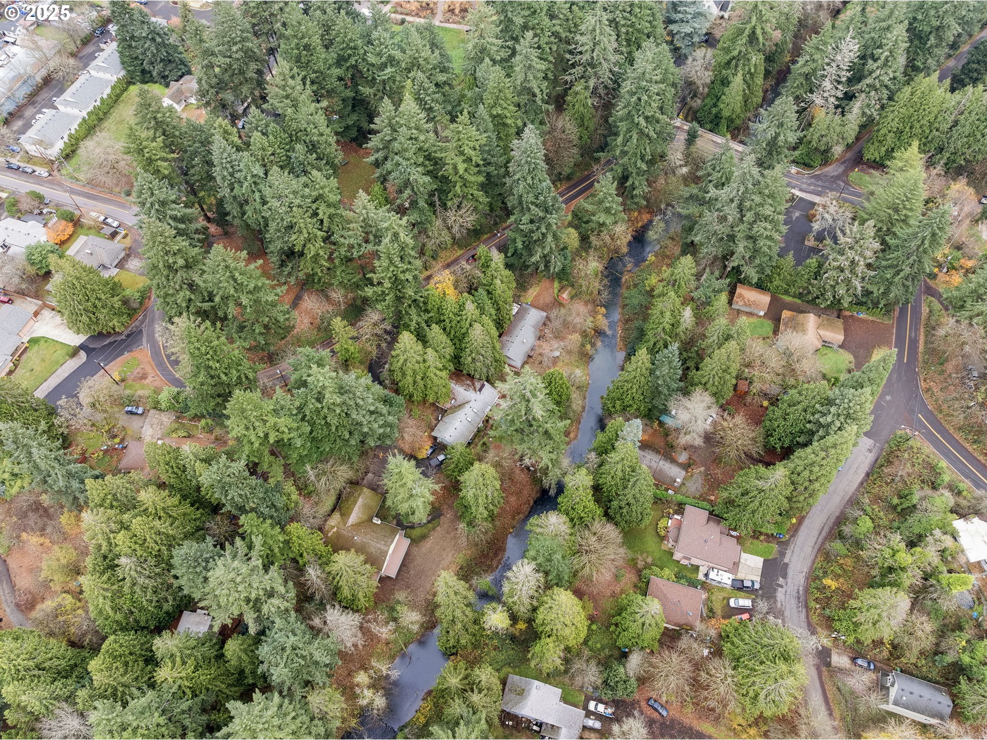 6647 Southeast 122nd Avenue Portland, OR 97266 - Photo 14 of 48 an aerial view of a house with a yard and outdoor seating