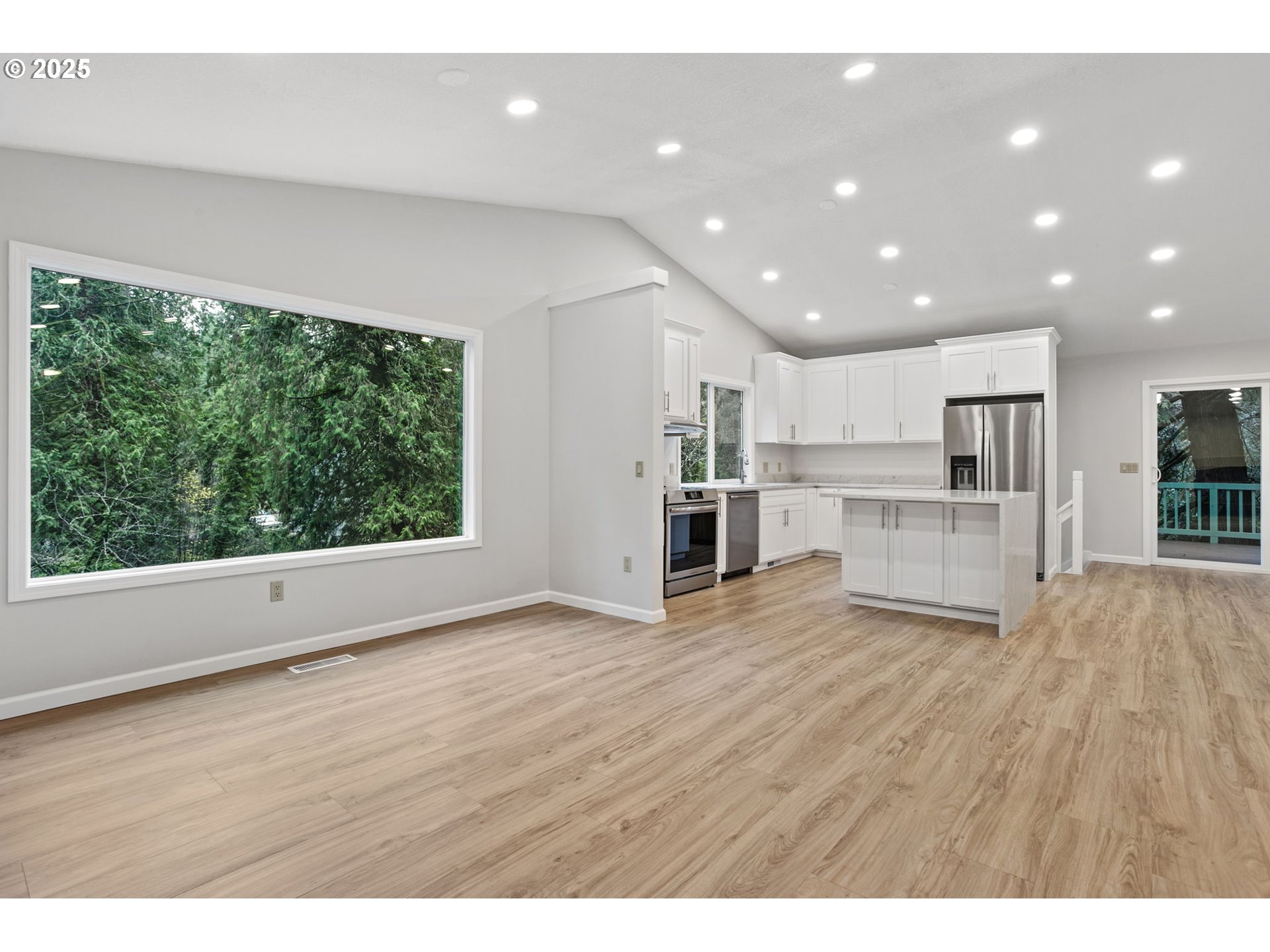 6647 Southeast 122nd Avenue Portland, OR 97266 - Photo 20 of 48 a view of kitchen with wooden floor