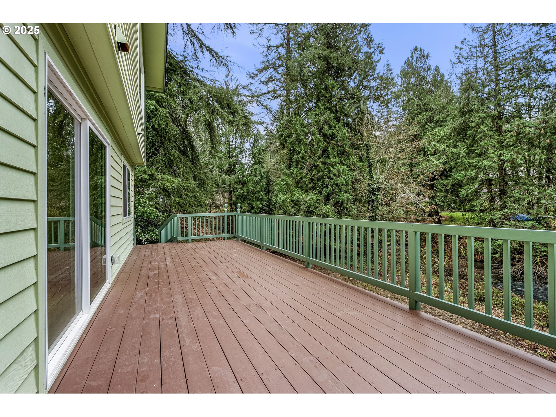 6647 Southeast 122nd Avenue Portland, OR 97266 - Photo 2 of 48 a view of balcony with wooden floor