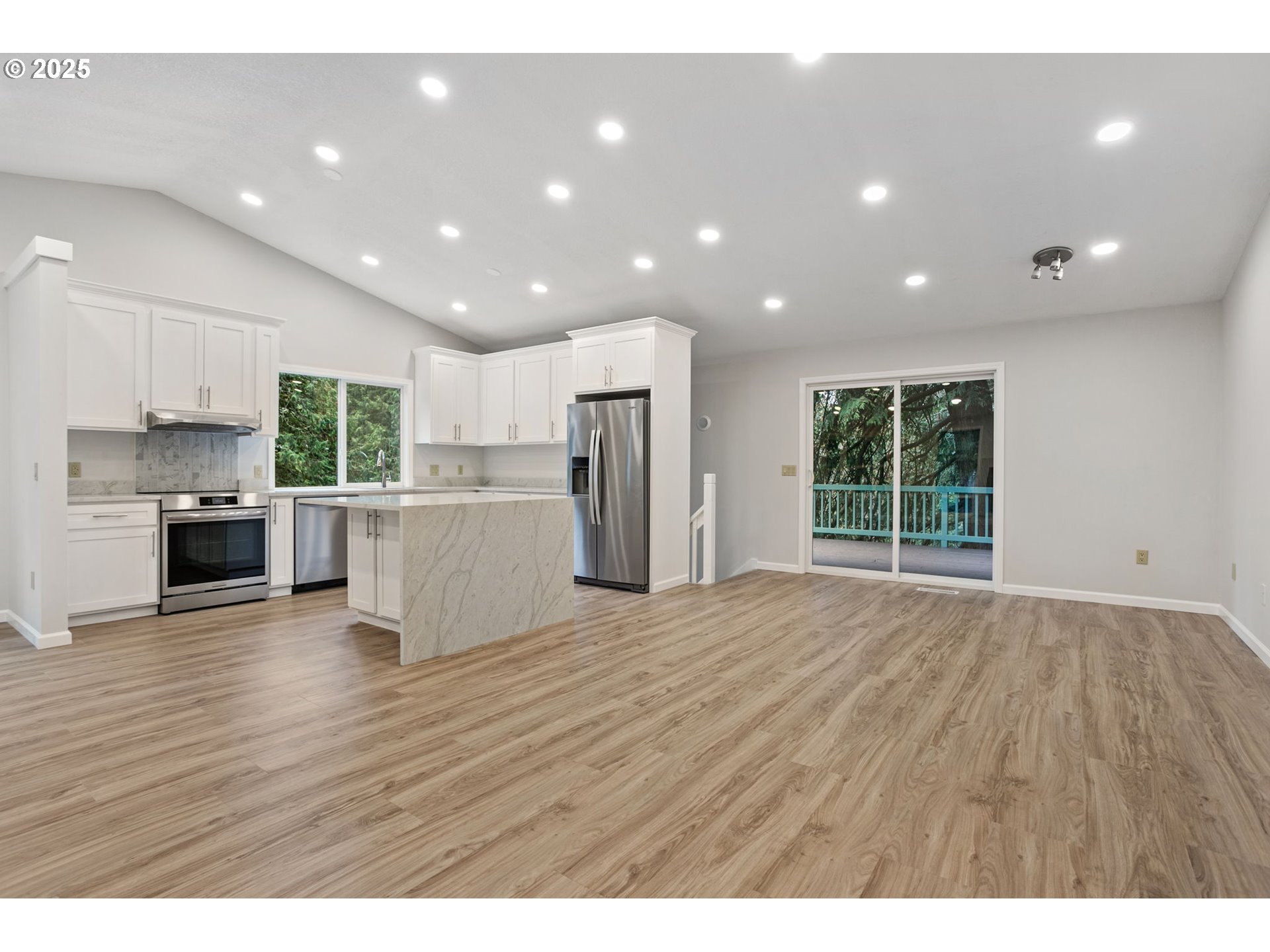 6647 Southeast 122nd Avenue Portland, OR 97266 - Photo 27 of 48 a view of kitchen with wooden floor