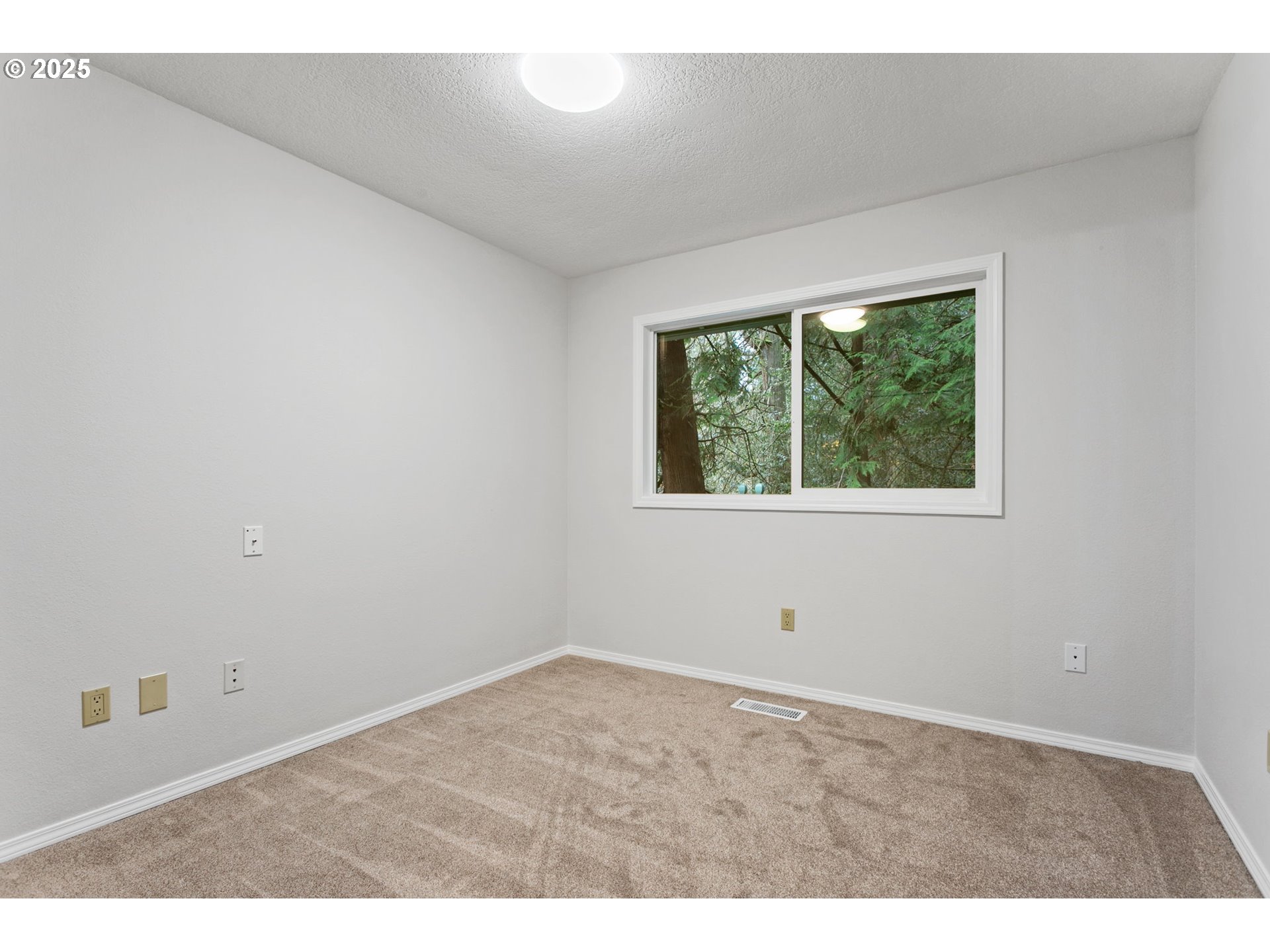 6647 Southeast 122nd Avenue Portland, OR 97266 - Photo 41 of 48 a room with windows