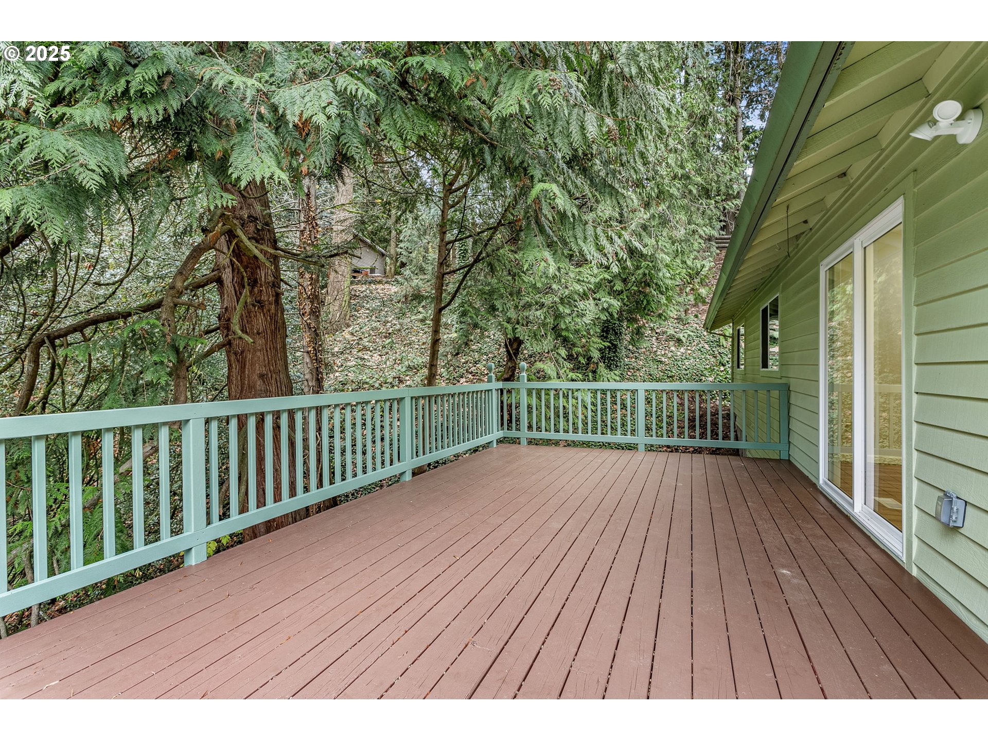 6647 Southeast 122nd Avenue Portland, OR 97266 - Photo 46 of 48 a view of balcony with wooden floor