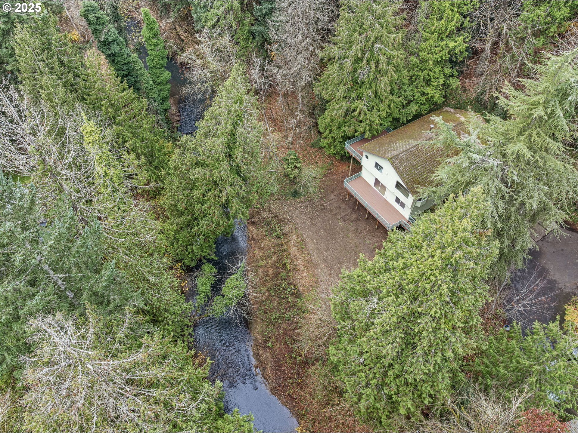 6647 Southeast 122nd Avenue Portland, OR 97266 - Photo 7 of 48 an aerial view of a house with a yard
