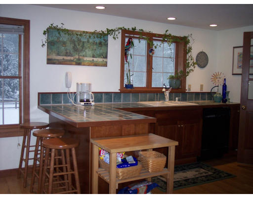 349 Green River Road Greenfield, MA 01301 - Photo 3 of 7 a kitchen with a sink cabinets and window