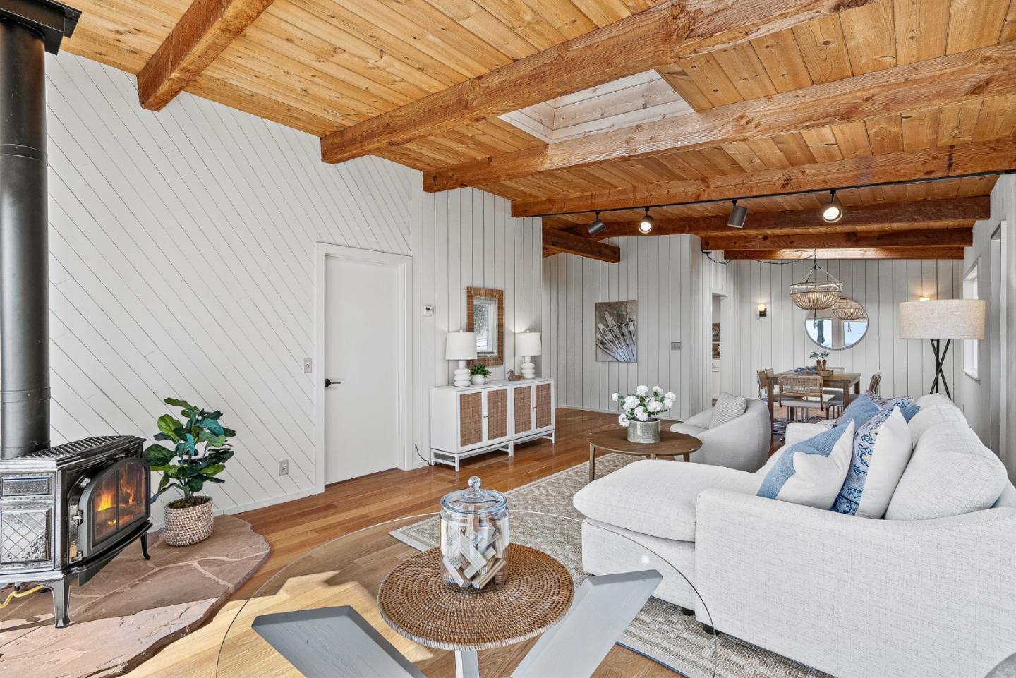 664 Bayview Drive Aptos, CA 95003 - Photo 13 of 46 a living room with furniture and a potted plant