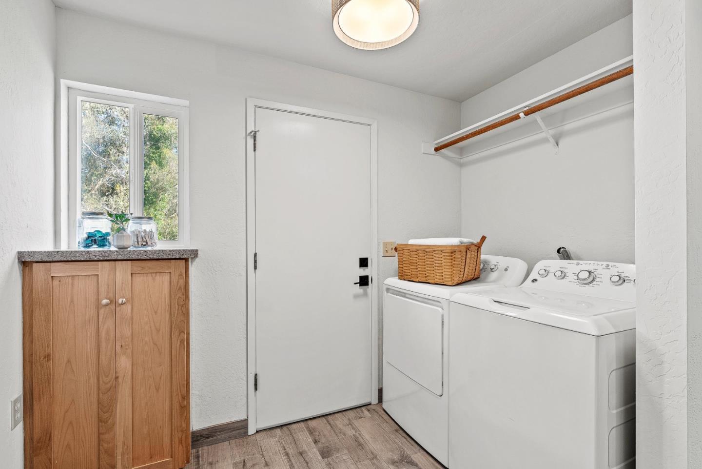 664 Bayview Drive Aptos, CA 95003 - Photo 27 of 46 a utility room with dryer and washer
