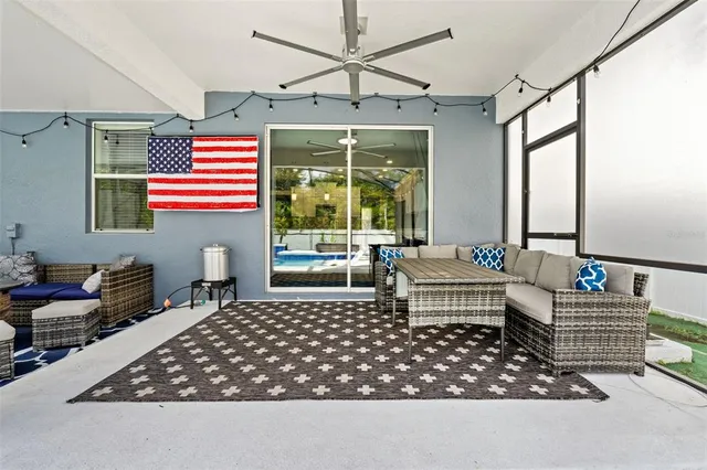 an aerial view of a house with a garden and swimming pool