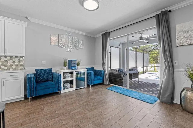 a living room with furniture and a window