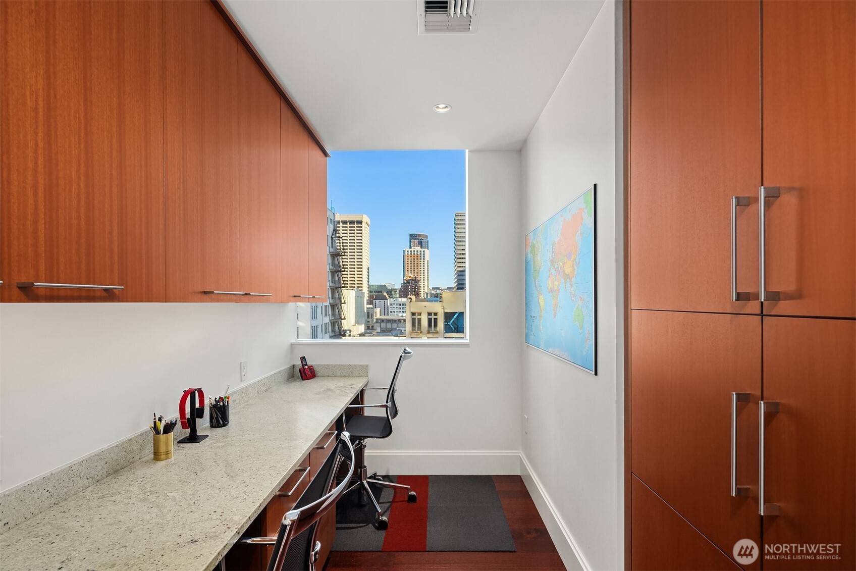 1521 2nd Avenue, Unit 1001 Seattle, WA 98101 - Photo 18 of 37 a room with a window and refrigerator