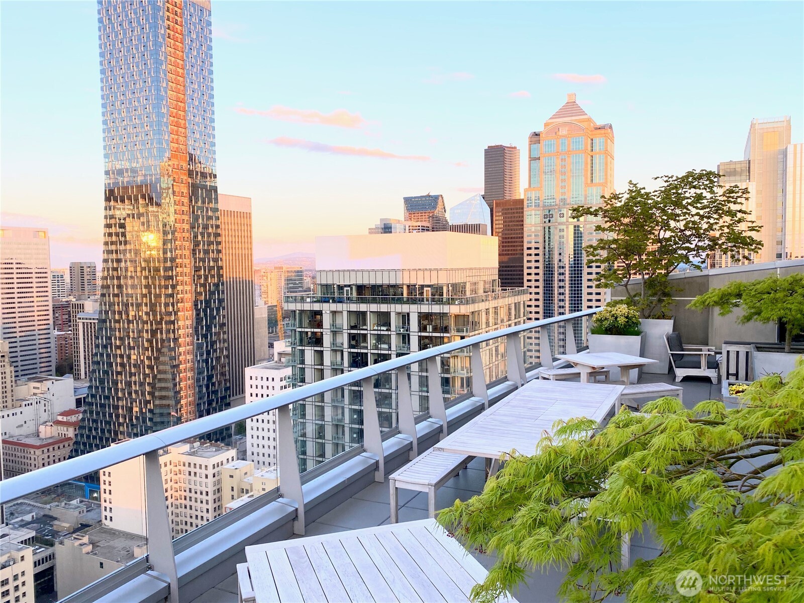 1521 2nd Avenue, Unit 1001 Seattle, WA 98101 - Photo 31 of 37 a view of a balcony with chairs