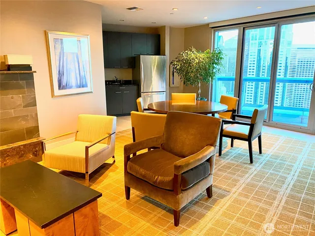 a group of cars parked in front of a house