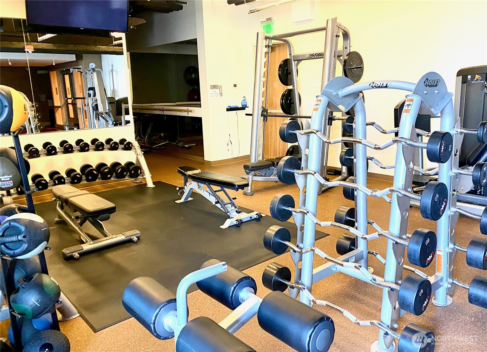 1521 2nd Avenue, Unit 1001 Seattle, WA 98101 - Photo 36 of 37 a group of cars parked in front of a house