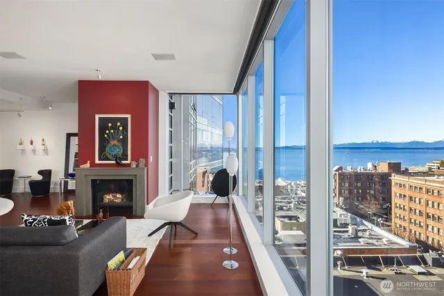 a living room with furniture fireplace and flat screen tv
