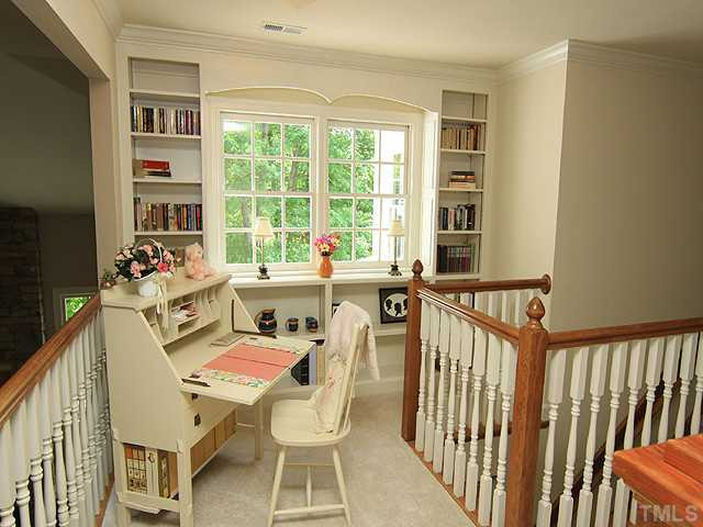 113 Raphael Drive Cary, NC 27511 - Photo 8 of 16 This second floor loft area can easily handle a desk or bookshelves for a wonderful reading area. Loft
