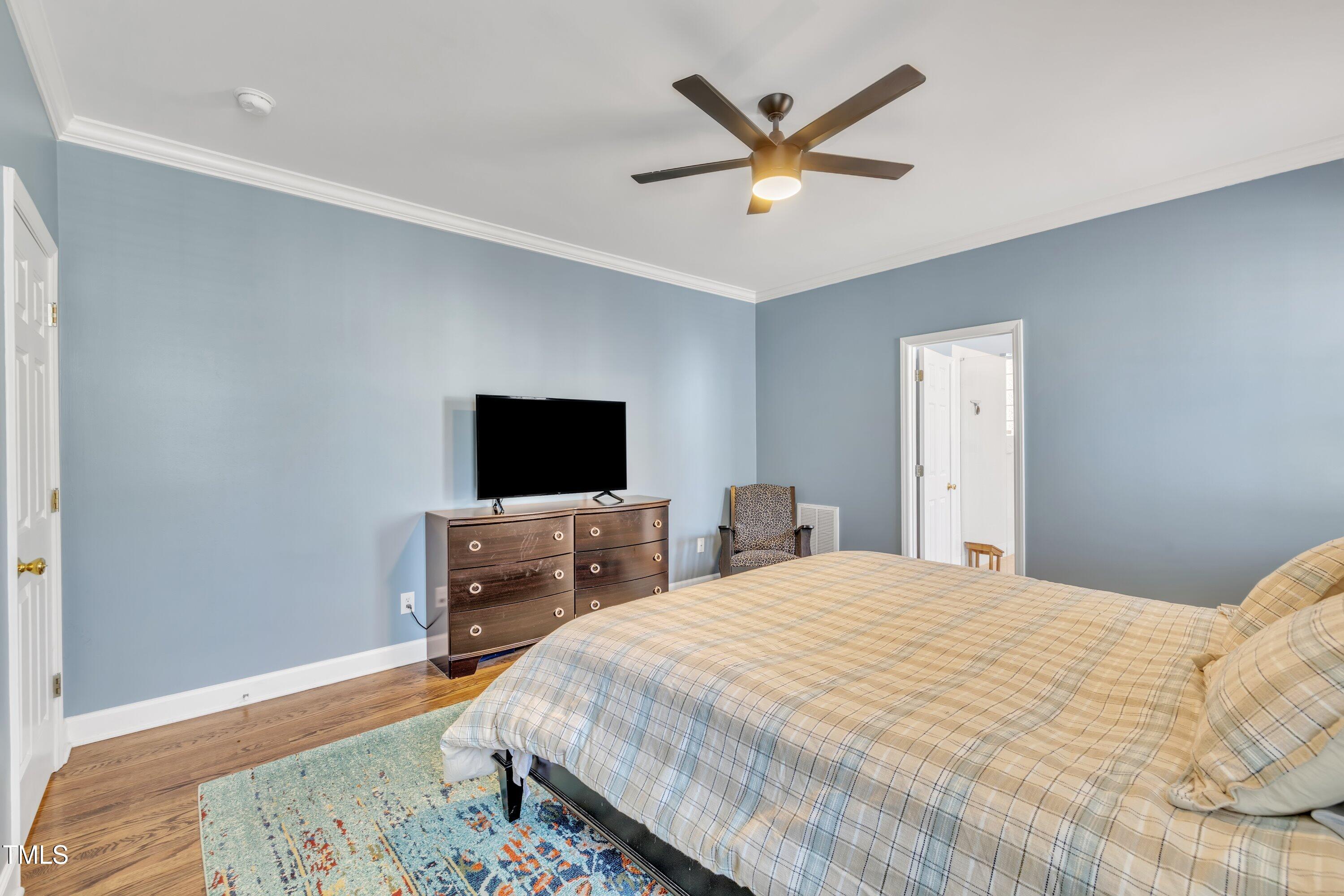 7505 Nichols Road Raleigh, NC 27615 - Photo 22 of 45 1st floor primary bedroom