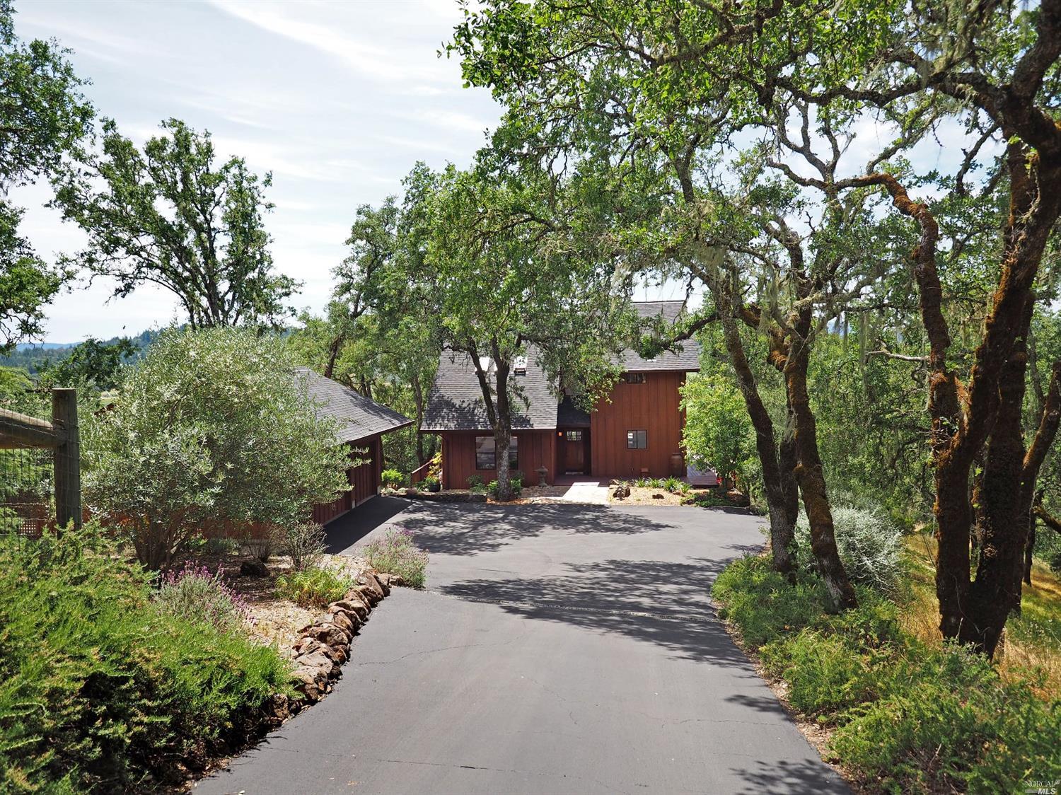515 Colony Road Geyserville, CA 95441 - Photo 1 of 1 a view of a backyard with large trees