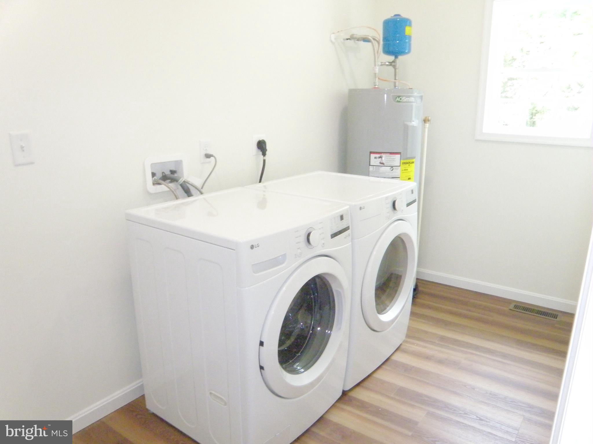3 Alfred Street Georgetown, DE 19947 - Photo 17 of 18 Utility Room with Front Load Washer and Dryer