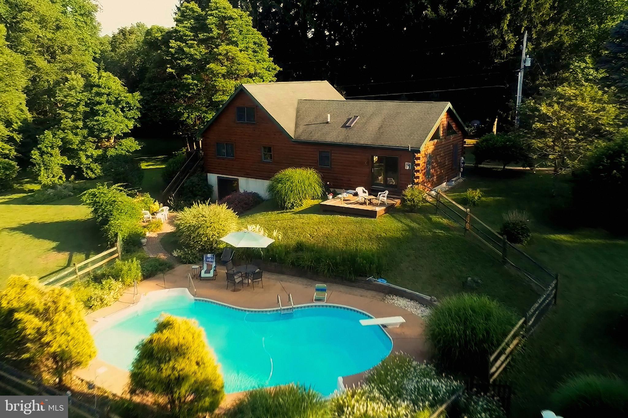 fenced and landscaped pool area