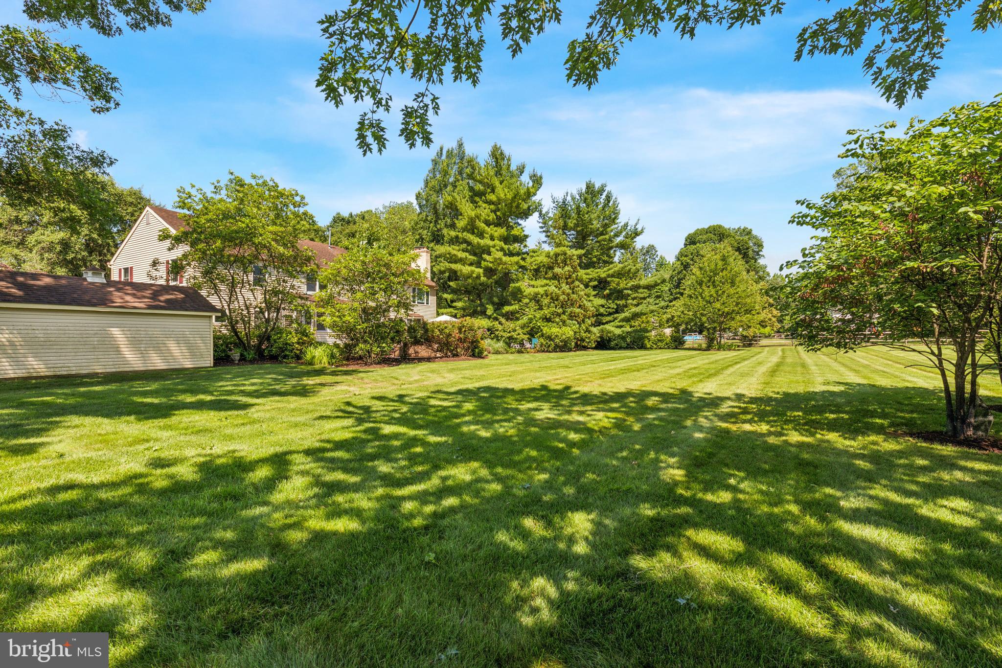 1015 Pheasant Meadow Road Blue Bell, PA 19422 - Photo 64 of 79 Professionally landscaped backyard.