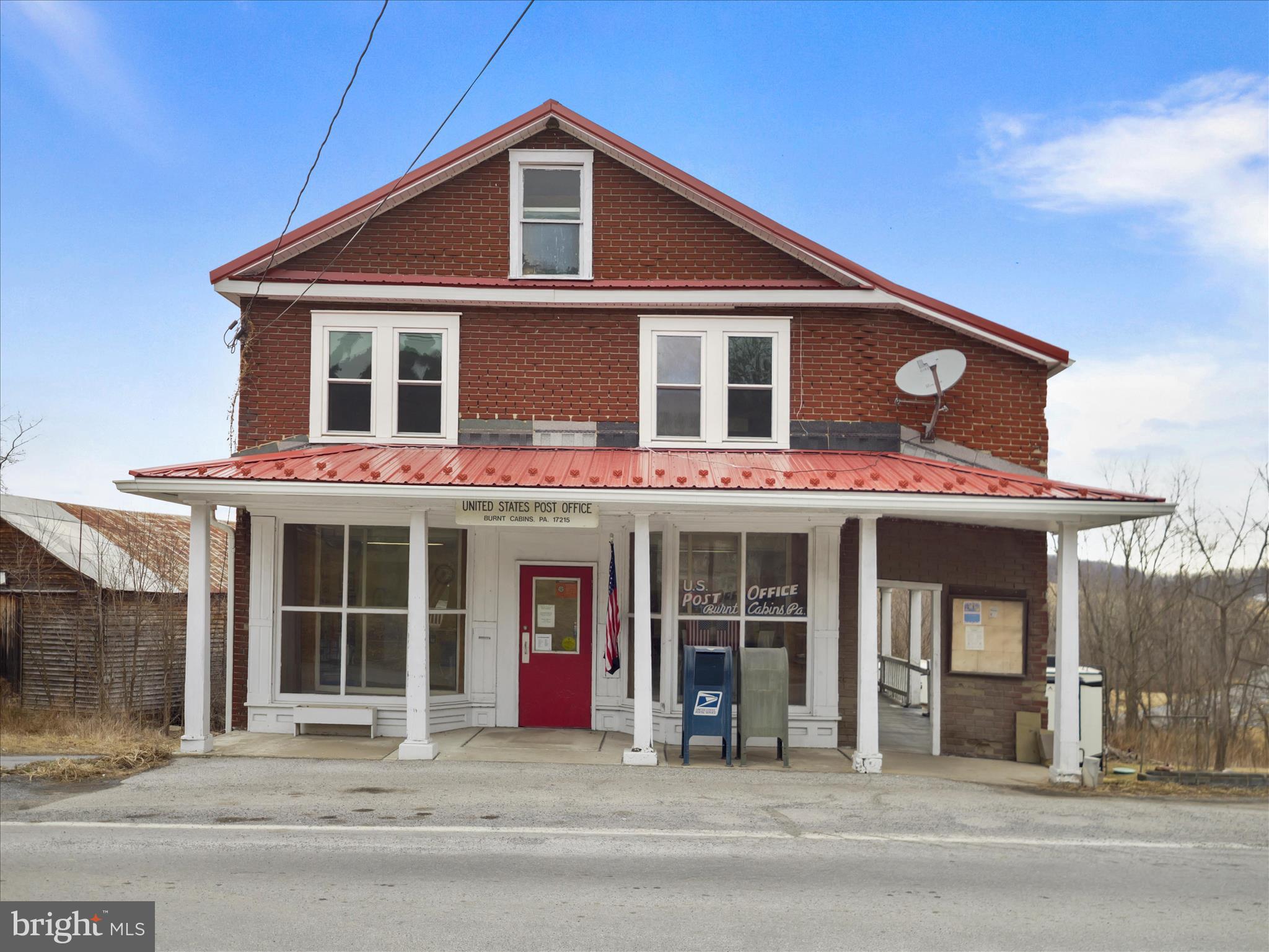 a front view of a house with a porch