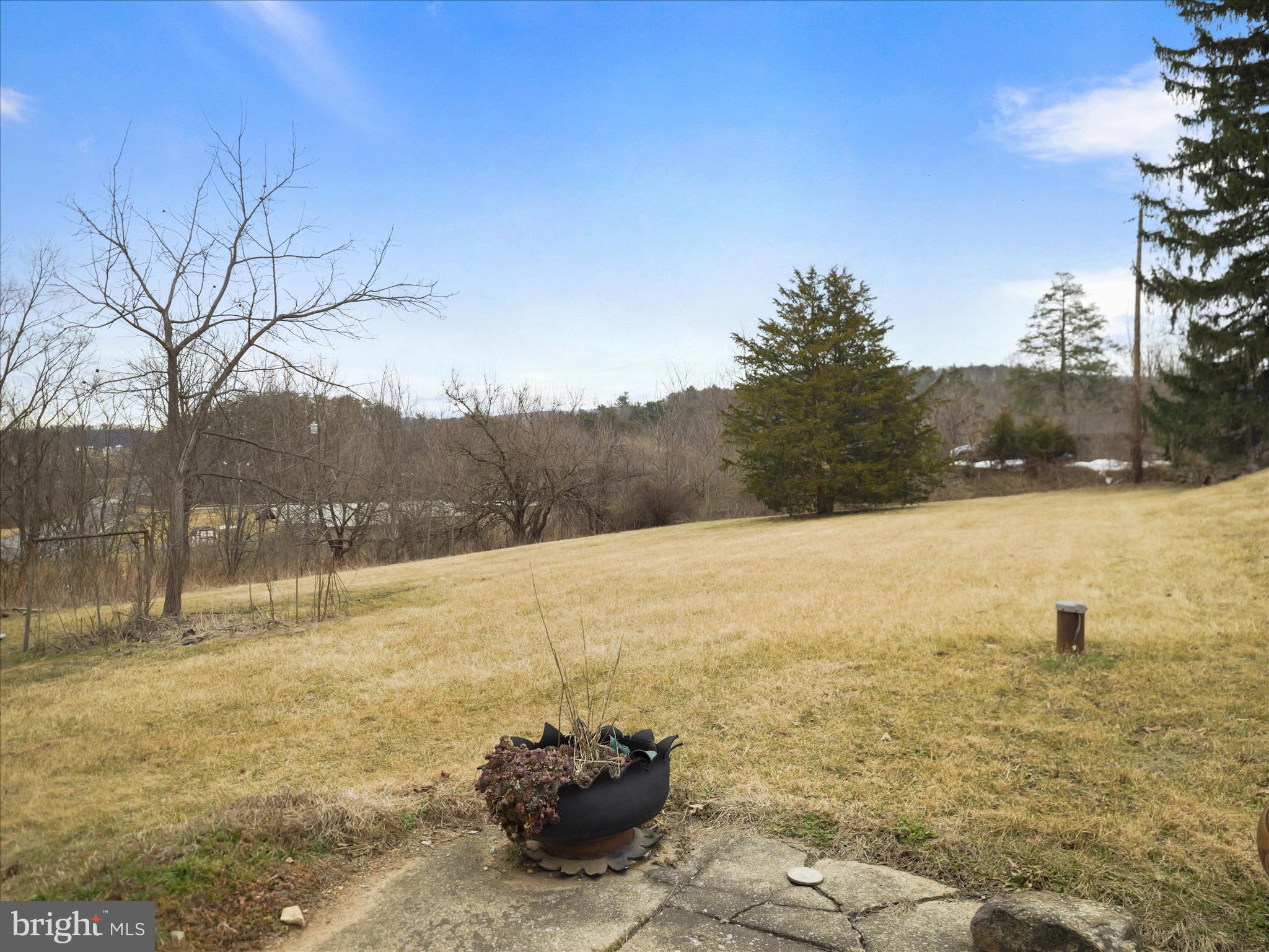 233 Grist Mill Road Burnt Cabins, PA 17215 - Photo 17 of 17 a view of a lake with a yard