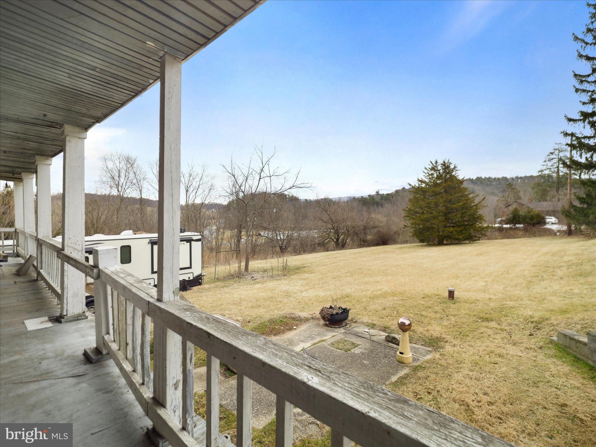 233 Grist Mill Road Burnt Cabins, PA 17215 - Photo 9 of 17 a view of a terrace with wooden fence and floor