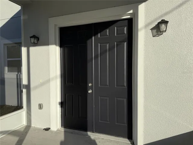 a view of elevator with hallway