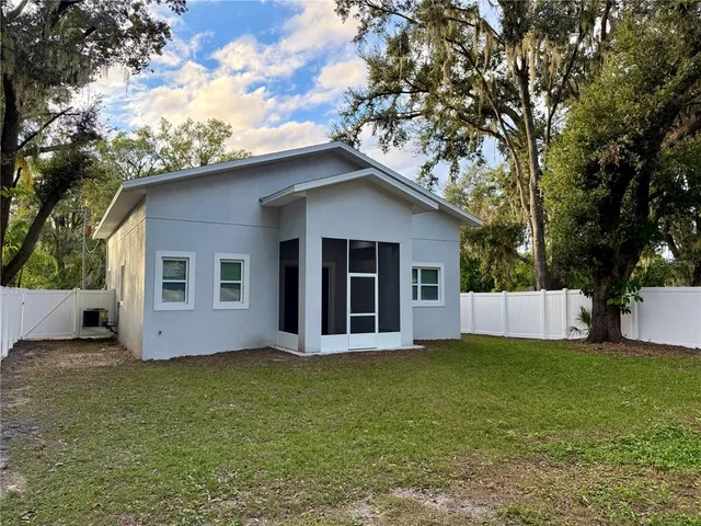 a house with garden in front of it