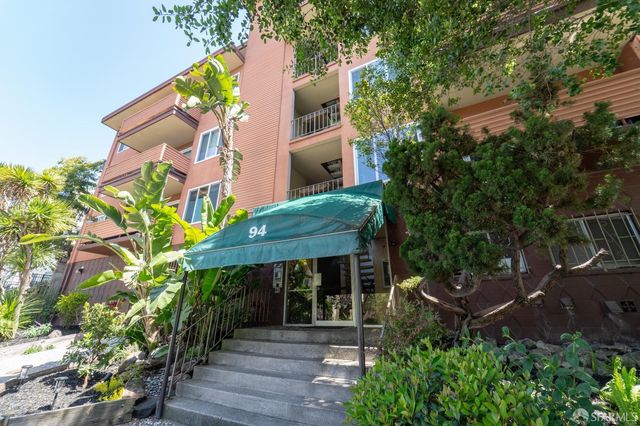 a car parked in front of a building