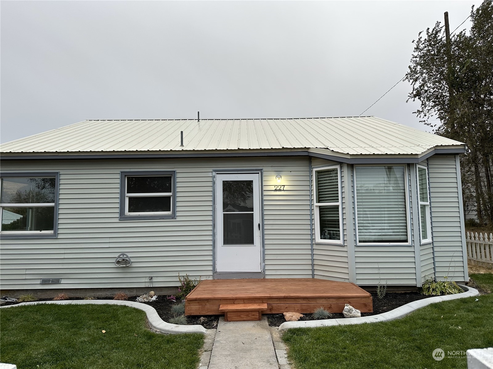 227 Columbia Road Ephrata, WA 98823 - Photo 21 of 21 a backyard of a house with barbeque oven and outdoor seating