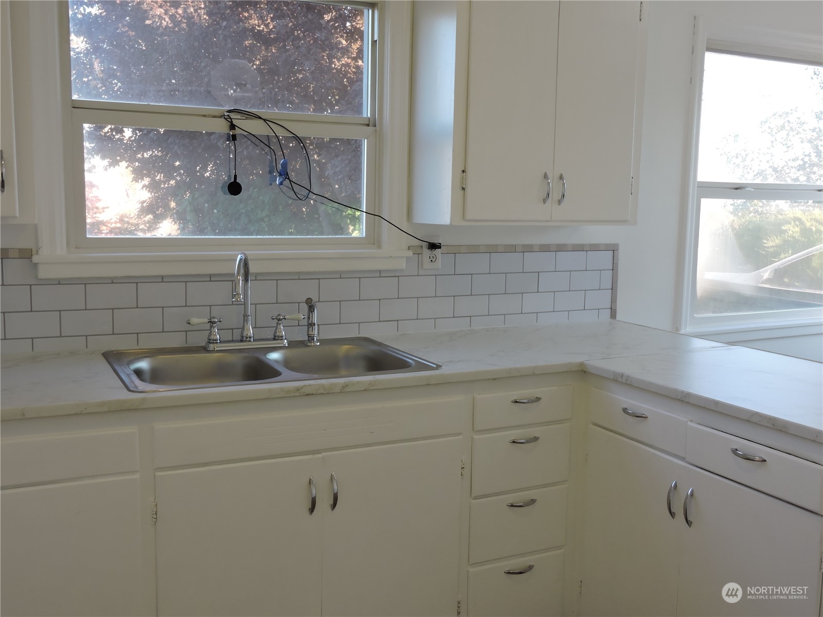 227 Columbia Road Ephrata, WA 98823 - Photo 10 of 21 a bathroom with a sink and a window
