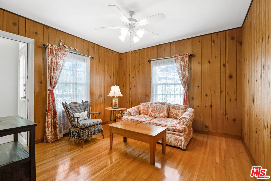 1215 North Everett Street Glendale, CA 91207 - Photo 17 of 31 a living room with furniture and a window