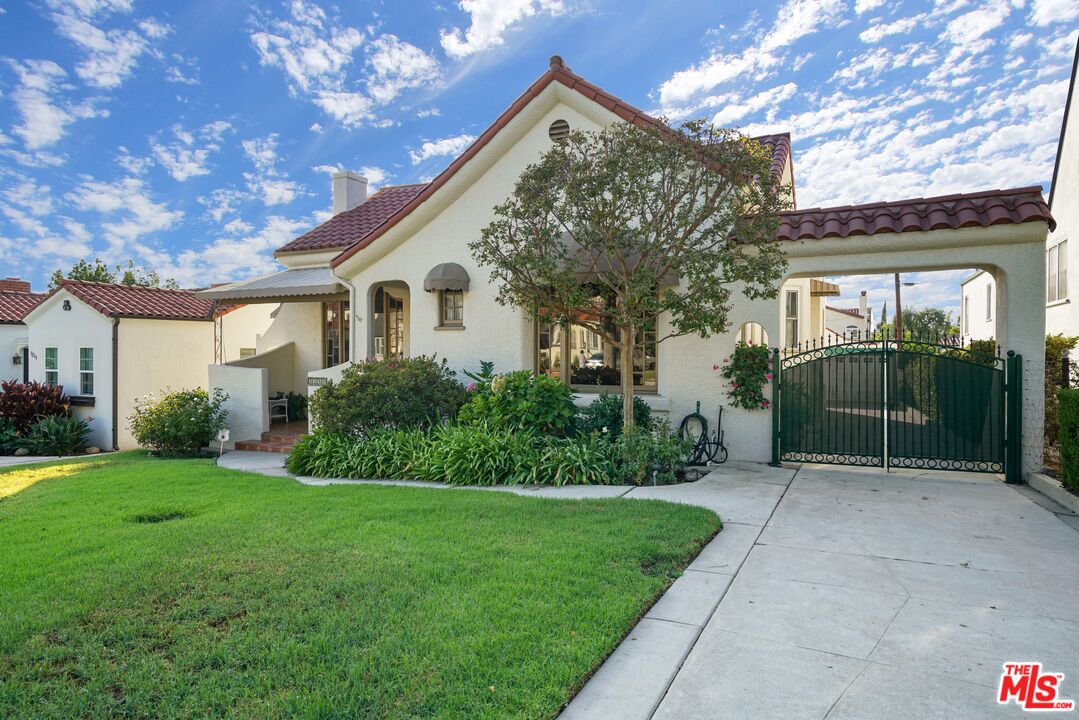 1215 North Everett Street Glendale, CA 91207 - Photo 2 of 31 a view of a house with a yard and potted plants