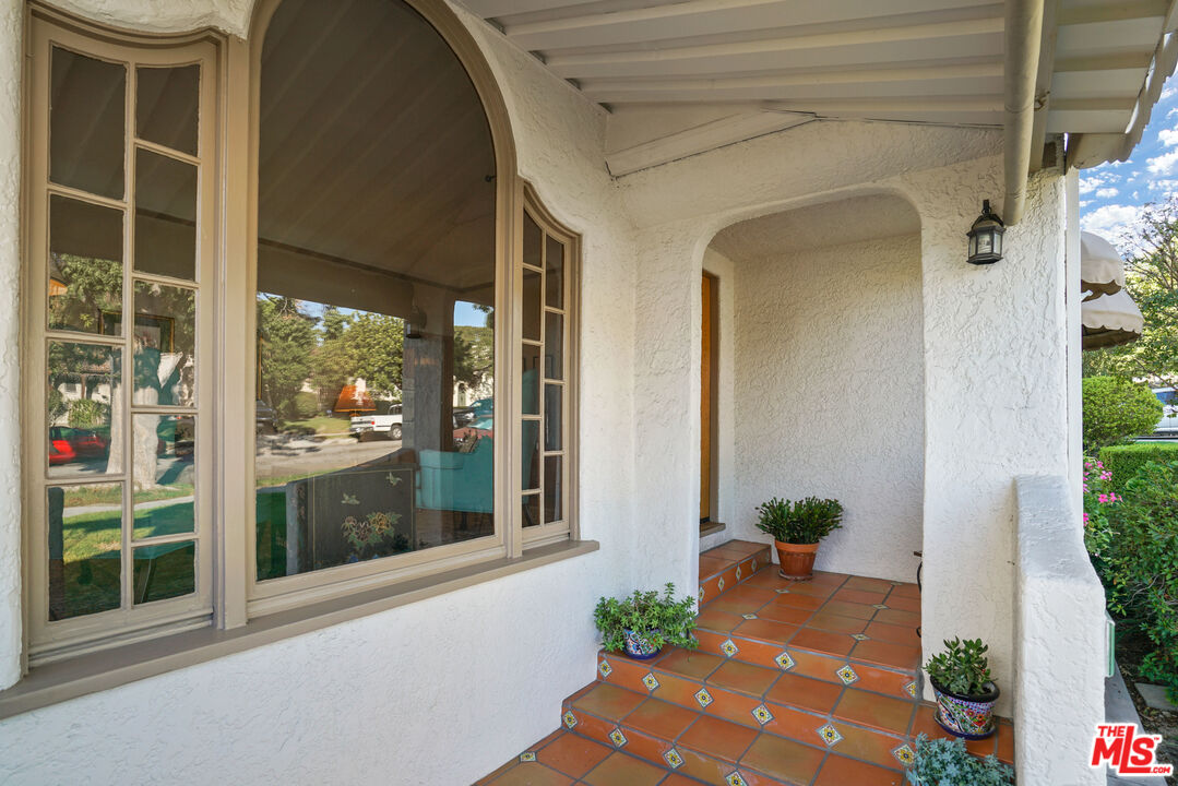 1215 North Everett Street Glendale, CA 91207 - Photo 3 of 31 a front view of a house with a yard