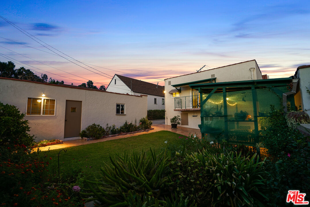 1215 North Everett Street Glendale, CA 91207 - Photo 28 of 31 a backyard of a house with plants and garden