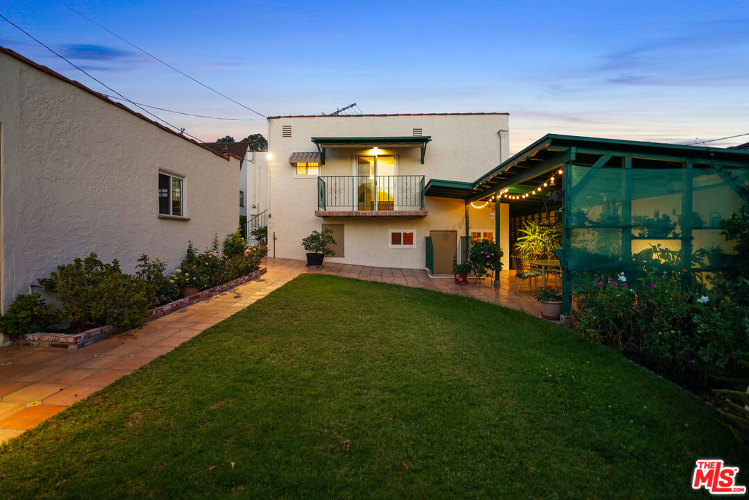 1215 North Everett Street Glendale, CA 91207 - Photo 29 of 31 a front view of a house with a garden