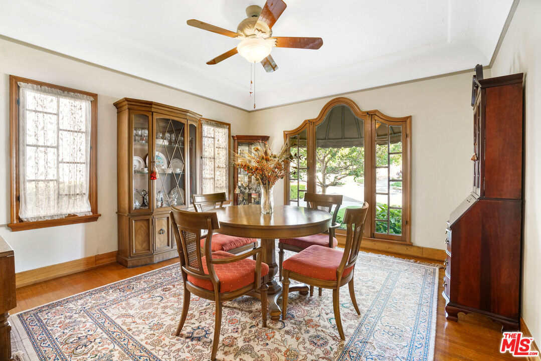 1215 North Everett Street Glendale, CA 91207 - Photo 7 of 31 a view of a dining room with furniture window and wooden floor