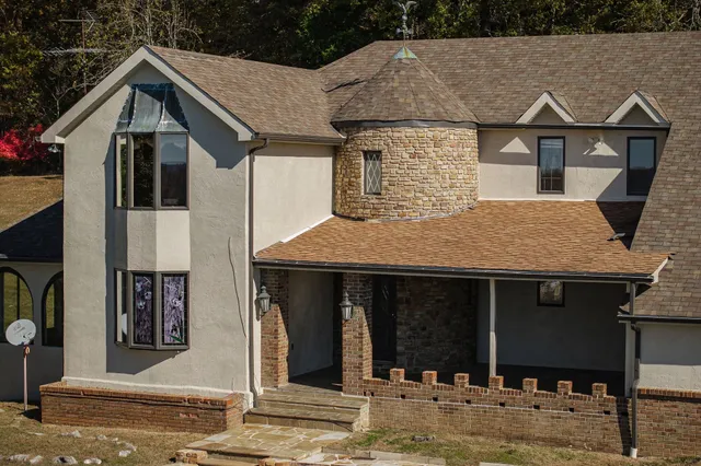 a view of a back yard of the house