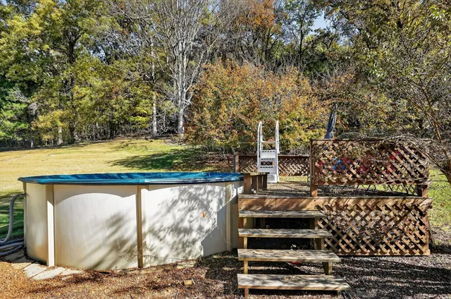 a kitchen with kitchen island cabinets and window