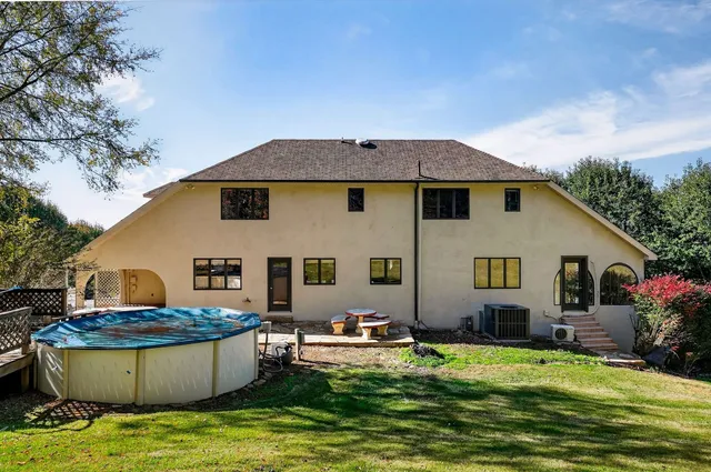 a kitchen with stainless steel appliances a refrigerator and a stove