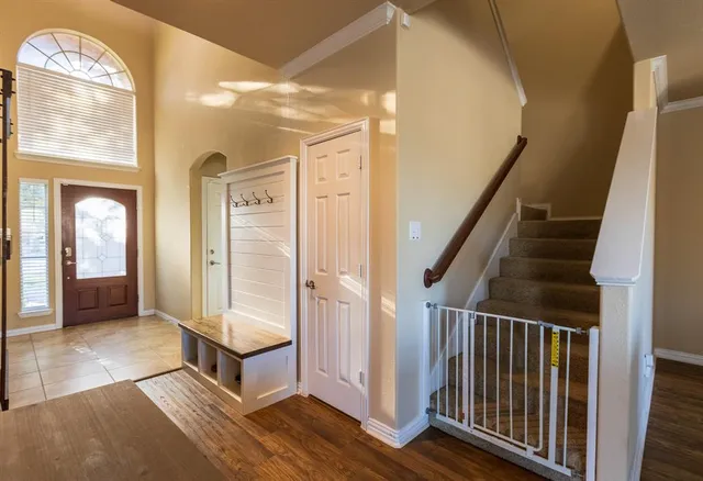 a view of an entryway with staircase