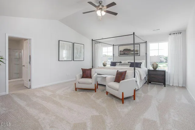 a bed room with a bed and a chandelier