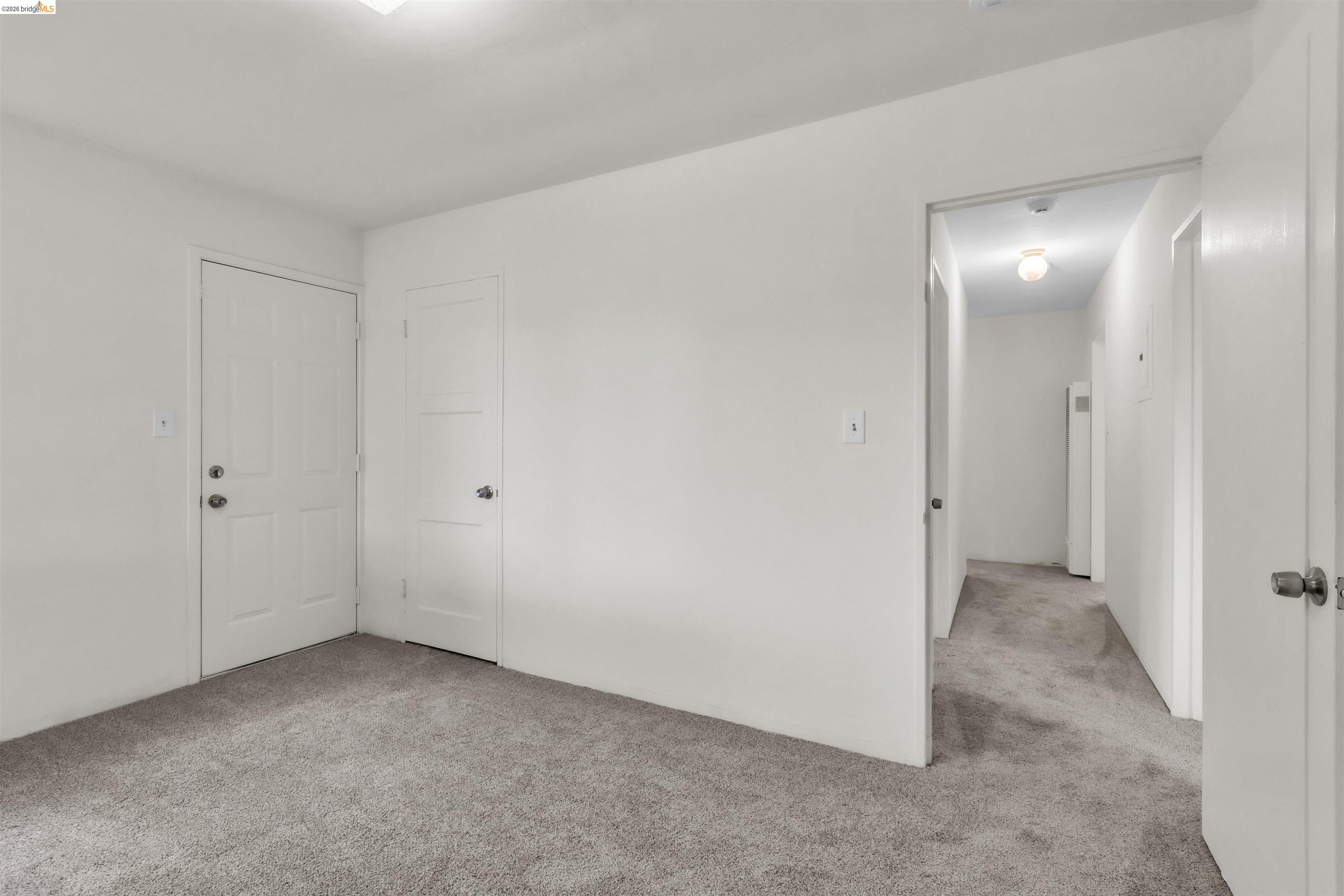 621 Paseo Del Rio San Lorenzo, CA 94580 - Photo 15 of 24 Neutral color palette with light gray carpeting and white walls