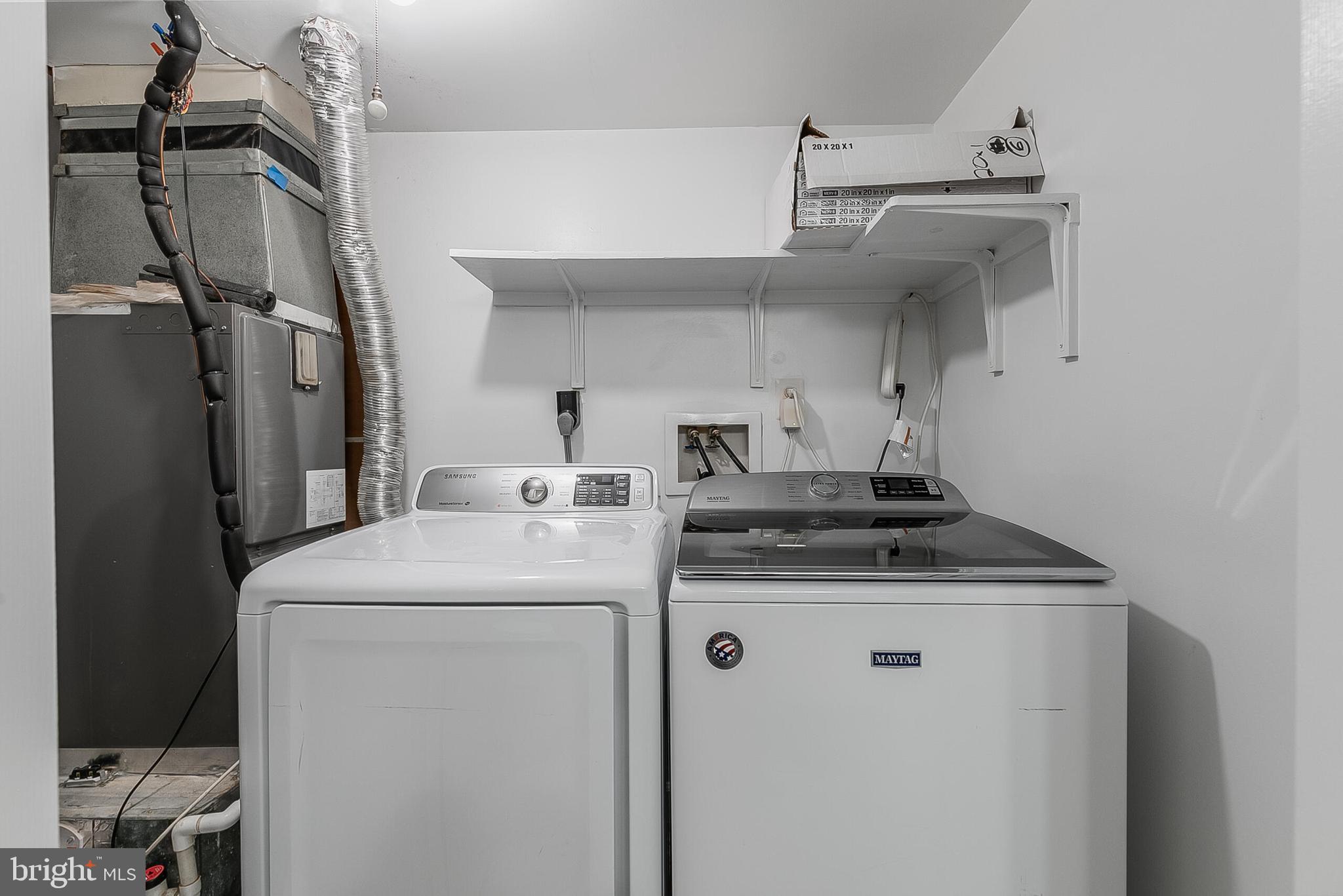 110 Prosperity Avenue Southeast, Unit A Leesburg, VA 20175 - Photo 21 of 22 a utility room with dryer and washer