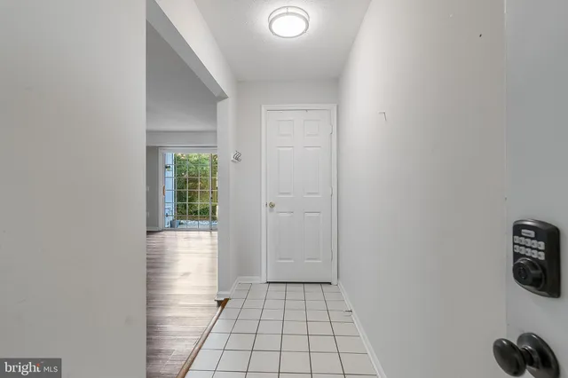 a view of an empty room and window
